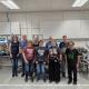 Afbeelding Jan Willem Timmerman van MCi met de medewerkers van Werkzaak die aan MCi werken